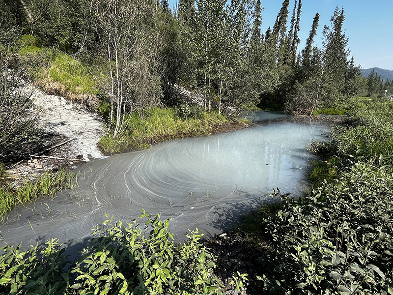 Gypsum precipitation at sulfur spring discharge, Yukon, Canada.
