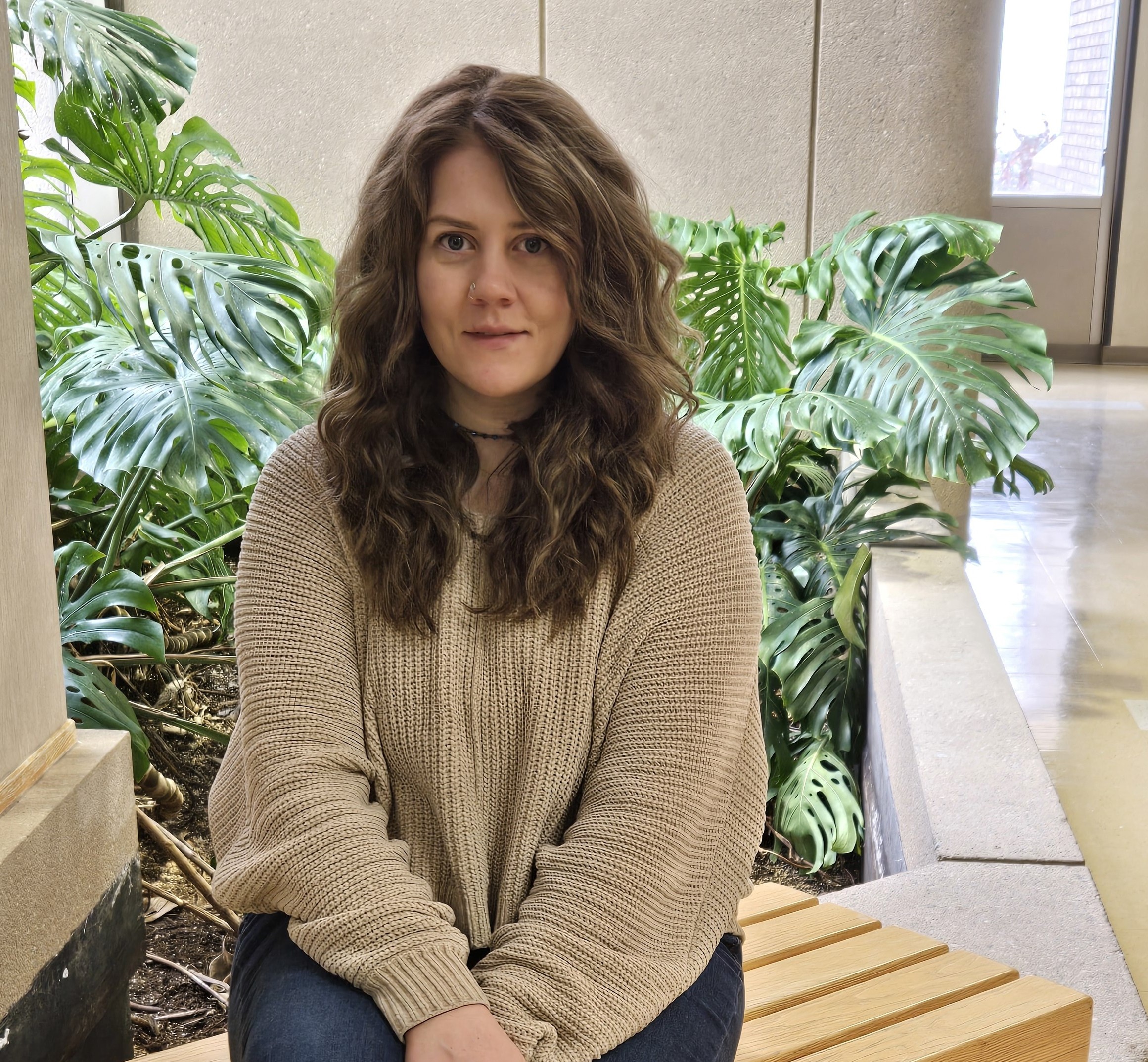 GWFO Technician Katy Nugent Sitting on a Bench