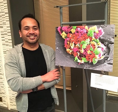 Awang with a print of his winning photo